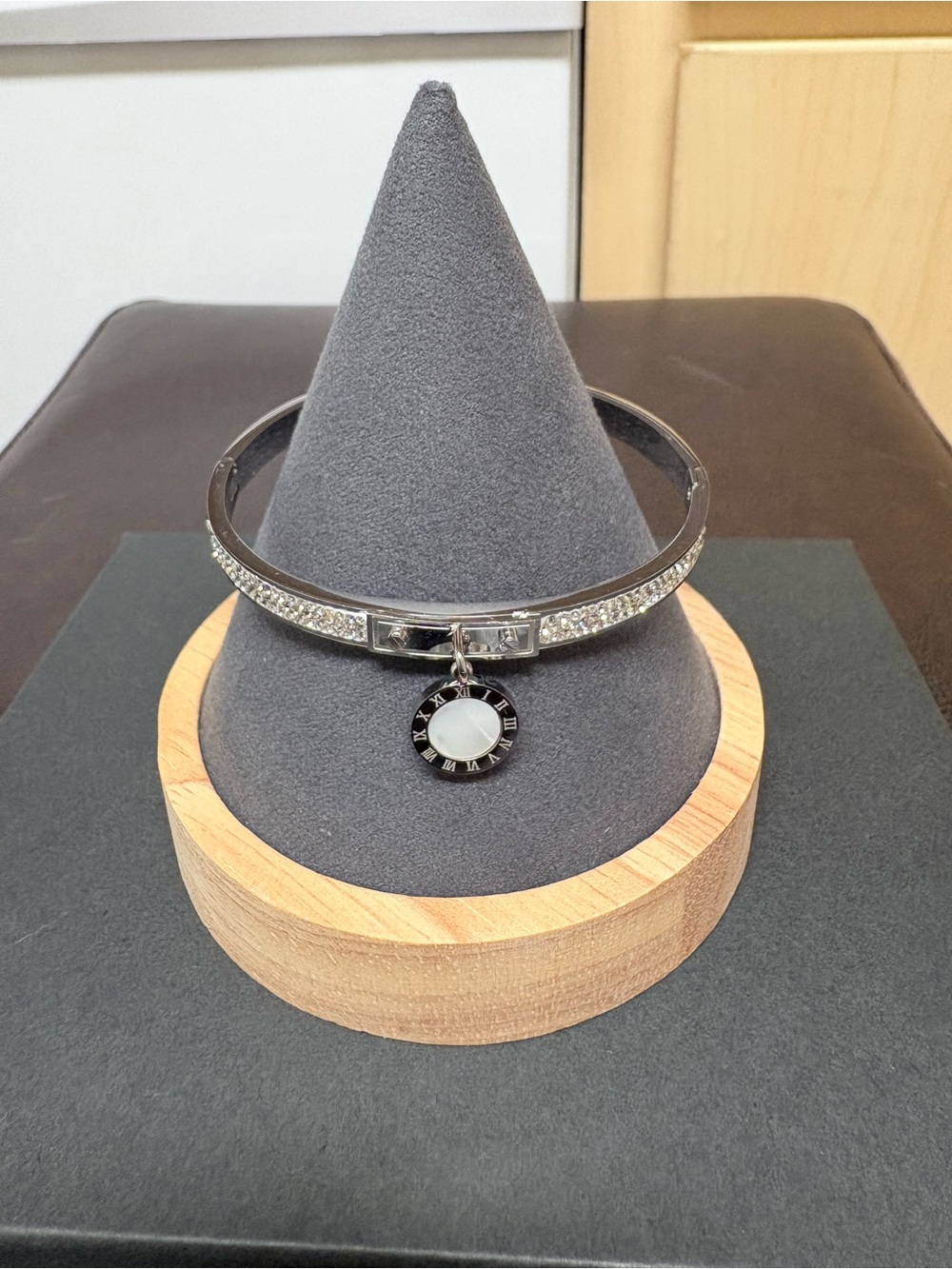 Silver-Tone Pavé Bangle Bracelet with Black and White Charm
